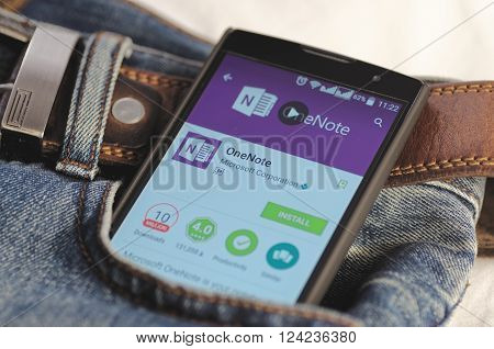 SARANSK, RUSSIA - April 3, 2016: Photo of Smartphone in a jeans pocket with Microsoft OneNote application in a Google Play Store on the screen.