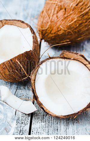 Fresh Coconuts In The Shell On A Blue Wooden Background