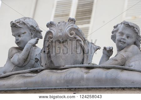 Detail of an old front of a building in Saint-Cloud, France