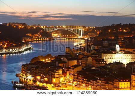 Porto old town and Arrabida bridge (Ponte da Arrabida) in the evening, Portugal