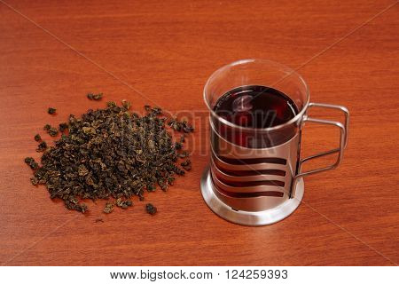 glass mug and poured tea on wooden table
** Note: Visible grain at 100%, best at smaller sizes