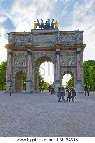 PARIS FRANCE - MAY 3 2012: Triumphal Arch in Paris in France. The Arc de Triomphe du Carrousel is a triumphal arch of Paris and is located in the Place du Carrousel