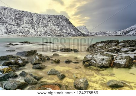 Haukland Beach in the Lofoten Islands Norway in the winter at dusk.