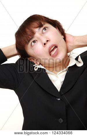 portrait of demented businesswoman on white background