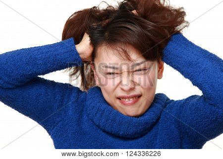 portrait of Asian woman demented on white background
