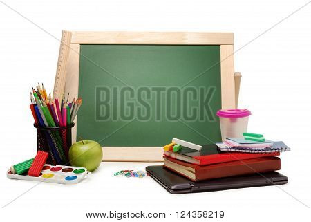 Group of school and office supplies with chalkboard watercolor paints, stack of colored pencils and markers, isolated on white