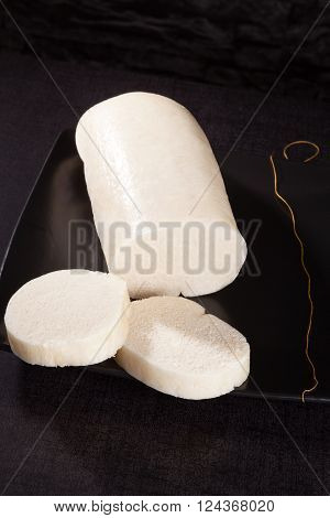 Traditional bread dumplings on black background. Europeand traditional cuisine.