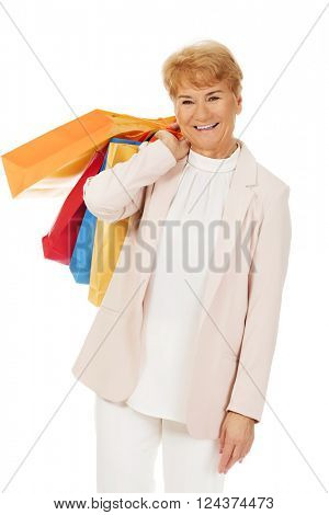 Happy business woman holging shopping bags
