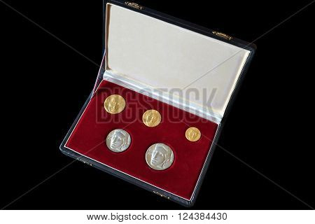 YUGOSLAVIA - CIRCA 1976 : Set of gold and silver medallions, made by Zlatara Majdanpek, Yugoslavia, that show portrait of scientist Nikola Tesla.