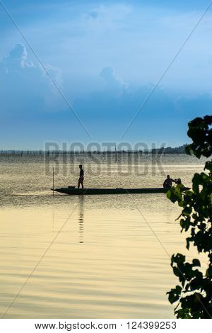 fisherman on wook boat at songkhla lake