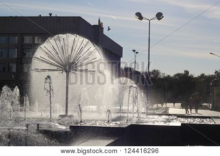 A beautiful fountain in the form of a ball on the square in the old town