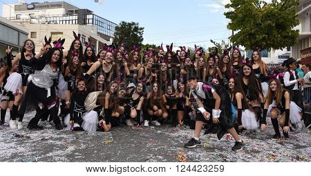 LIMASSOL CYPRUS - MARCH 13 : Happy people in teams dressed with colorful costumes at famous Limassol Carnival Parade on March 13 2016 in Limassol town Cyprus.