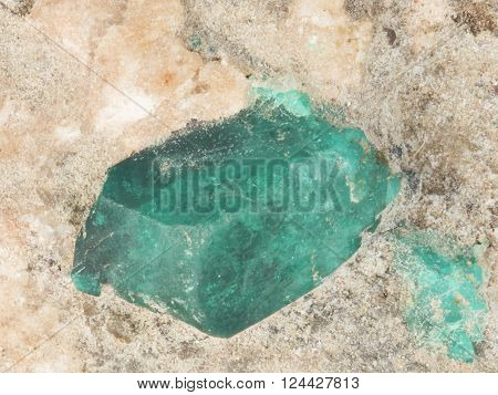 Raw dioptase crystals in stone macro selective focus