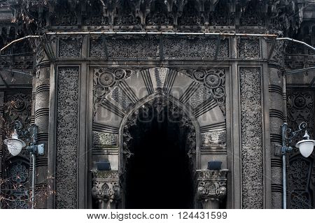 on facade of the pointed arch in Gothic style.