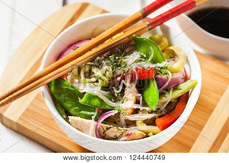 Delicious asian rice glass noodles with vegetables and chicken (wok)
