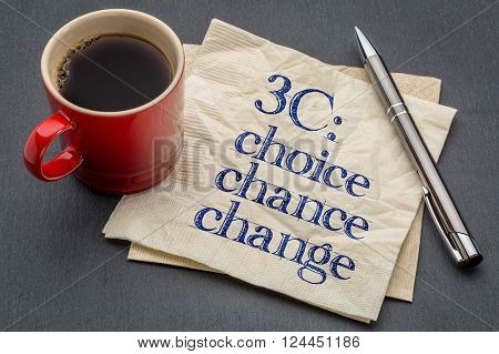 3C concept - choice, chance and change- handwriting on a napkin with cup of coffee against gray slate stone background