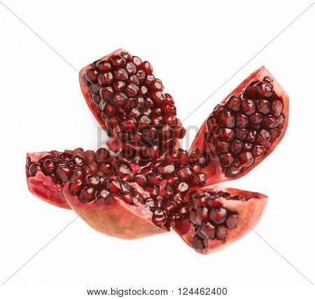 Split open flower served pomegranate Punica granatum fruit isolated over the white background