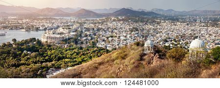Lake Pichola with City Palace panoramic view from the hill in Udaipur Rajasthan India