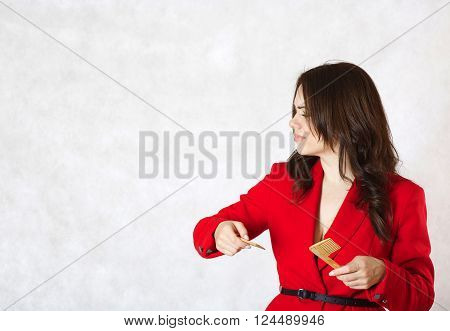 A Young Woman And A Broken Hair Comb