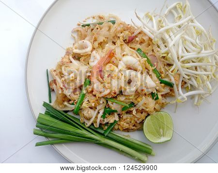 Thai Style Noodles. Thailand's National Dishes, Stir-fried Rice Noodles With Shrimp And Squid (pad T
