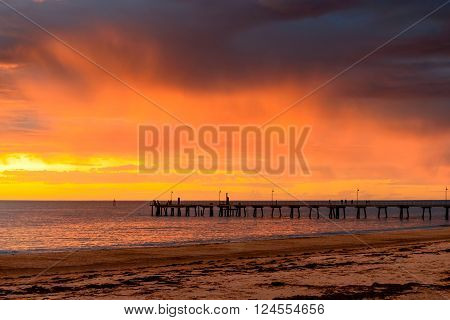 Stormy sunset above Glenelg Jetty South Australia