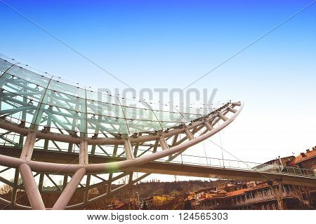Bridge of Peace in Tbilisi Geaorgia bow-shaped pedestrian bridge over the Kura River in Tbilisi capital of Georgia. One of the most important sites of Tbilisi
** Note: Visible grain at 100%, best at smaller sizes
