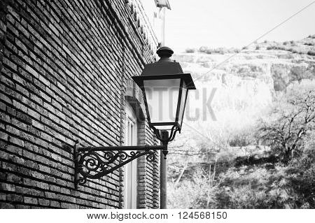 Traditional forged iron lamp on the street of Kalaubani area in Old Tbilisi