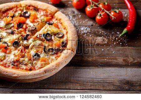 Vegeterian pizza with mushrooms and olives