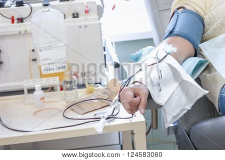 The process of sampling from the donor plasma. the instrument returns back to blood components, taking only the plasma