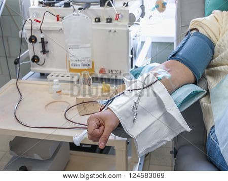 The process of sampling from the donor plasma. the instrument returns back to blood components, taking only the plasma