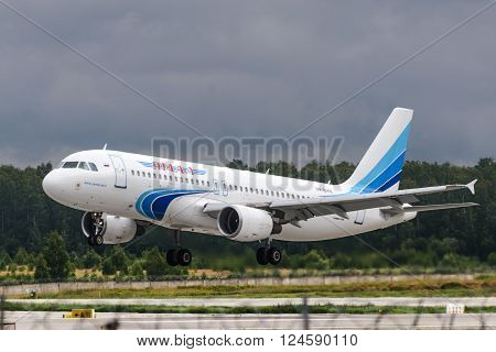 DOMODEDOVO RUSSIA - JULY 20: Aircraft operated by JSC Yamal Airlines take off from Moscow airport in Domodedovo on July 20 2013. The company in its fleet has 7 aircraft Airbus 320-200