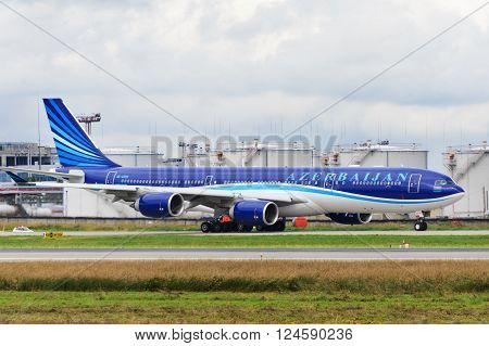 DOMODEDOVO RUSSIA - JULY 20: Azerbaijan Airlines Airbus A340 taxiing at Moscow airport in Domodedovo on July 20 2013. Azerbaijan Airlines is the national carrier of Azerbaijan.
** Note: Soft Focus at 100%, best at smaller sizes