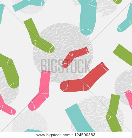Seamless pattern of colorful socks on light grey background
