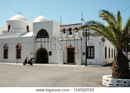 PATMOS, GREECE - JUNE 13, 2005: Church on the square near the harbor on the Greek island of Patmos