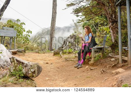 Mountaineer Girl Reading A Map