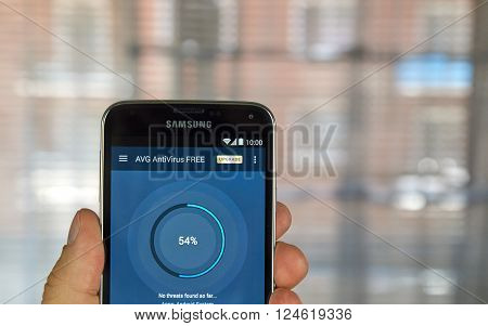 MONTREAL CANADA - APRIL 5 2016 : AVG antivirus on Android cell phone. AVG is one of the popular antivirus PC and mobile software.