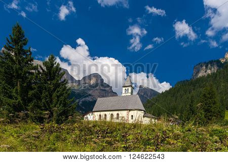 Ancient Church In An Idillyc Village In The Dolomites