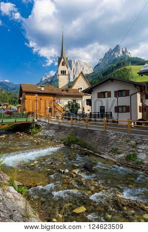 Ancient church in an idillyc village in the Dolomites