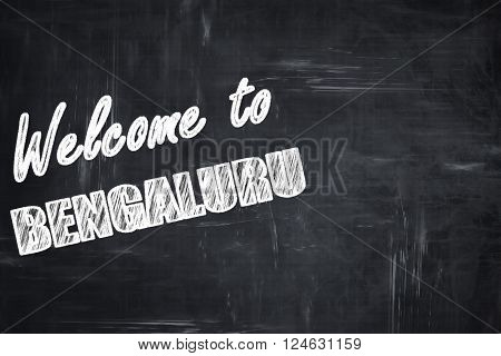 Chalkboard background with white letters: Welcome to bengaluru with some smooth lines