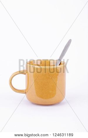 Coffee cup and spoons on break time