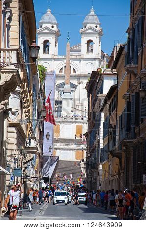 ROME-AUGUST 6: Via Condotti on August 6 2013 in Rome. Via Condotti (officially Via dei Condotti) is a busy and fashionable street of Rome Italy.