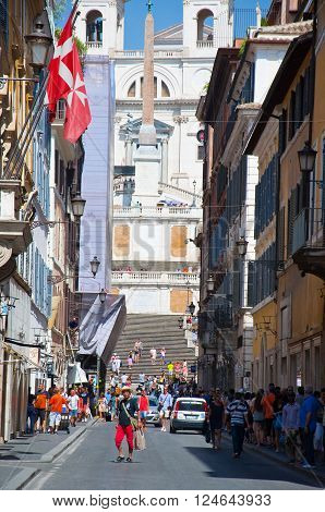 ROME-AUGUST 6: Via Condotti on August 6 2013 in Rome. Via Condotti (officially Via dei Condotti) is a busy and fashionable street of Rome Italy.