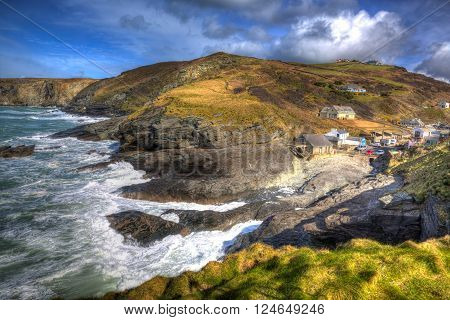 English coast village with waves Trebarwith Strand Cornwall England UK between Tintagel and Port Isaac in colourful HDR