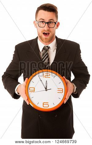 Successful businessman in formal suit chacking time on wrist watch isolated over white.