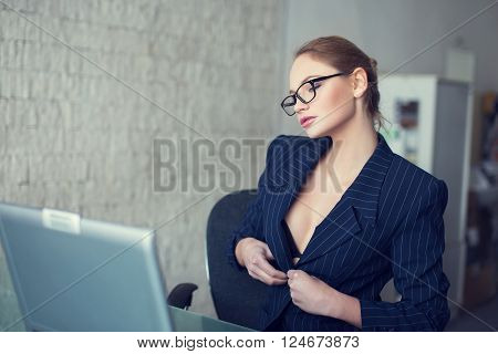 Sexy secretary in glasses undress in office online flirt and desire