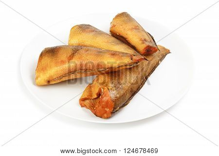 Smoked notothenia on plate isolated on a white background