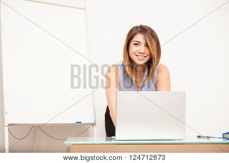 Cute Female Teacher Preparing A Lesson