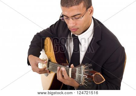 fado musician with a portuguese guitar, studio