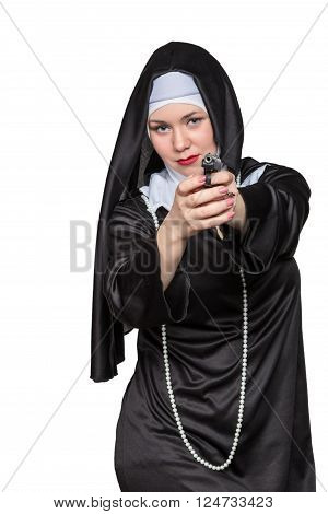 Nun aiming a gun at the camera isolated on a white background