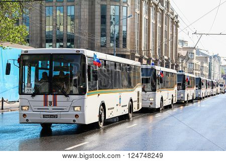 MOSCOW, RUSSIA - MAY 6, 2012: Line of the Emercom buses NefAZ 5299 in the city street.